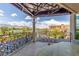 Balcony with wrought iron railings offering views of the city skyline and mountain views at 9101 Alta Dr # 203, Las Vegas, NV 89145