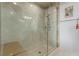 Large tiled walk-in shower with a built in bench and modern shower head at 9101 Alta Dr # 203, Las Vegas, NV 89145