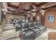 Luxurious home theater with plush seating, movie projector, and custom design at 9101 Alta Dr # 203, Las Vegas, NV 89145