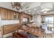 Gourmet kitchen with custom cabinets, granite countertops and stainless steel appliances at 9101 Alta Dr # 203, Las Vegas, NV 89145
