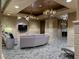Comfortable lobby seating area with a television and stylish decor at 9101 Alta Dr # 203, Las Vegas, NV 89145