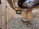 Elegant locker room with wood lockers, bench seating, and decorative accents at 9101 Alta Dr # 203, Las Vegas, NV 89145