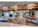 A comfortable lounge area featuring armchairs, a fireplace, and multiple seating arrangements at 9101 Alta Dr # 203, Las Vegas, NV 89145