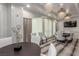 Elegant meeting room with modern decor, featuring tables, chairs, and a large window at 9101 Alta Dr # 203, Las Vegas, NV 89145
