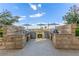 Outdoor kitchen featuring built-in stone counters and barbeque, offering a stylish cooking and dining space at 9101 Alta Dr # 203, Las Vegas, NV 89145