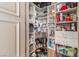 Walk-in pantry offers ample storage with shelves and drawers for kitchen essentials at 9101 Alta Dr # 203, Las Vegas, NV 89145
