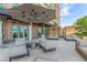 Stylish outdoor lounge area with comfortable seating and shade, ideal for relaxing and entertaining at 9101 Alta Dr # 203, Las Vegas, NV 89145