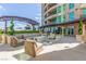 Luxurious patio with comfortable seating and lush landscaping, perfect for relaxing and entertaining guests at 9101 Alta Dr # 203, Las Vegas, NV 89145
