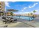 Inviting pool area with comfortable lounge chairs, offering a great place to relax and unwind outdoors at 9101 Alta Dr # 203, Las Vegas, NV 89145