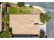 An aerial view displays the home's roof, a well-maintained lawn, and landscaping at 913 Hickory Park St, Las Vegas, NV 89138