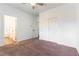 Bright bedroom features a closet, ceiling fan and an ensuite bathroom at 913 Hickory Park St, Las Vegas, NV 89138