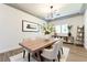 Cozy dining room with modern light fixture and stylish decor at 913 Hickory Park St, Las Vegas, NV 89138