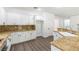 Well-lit kitchen boasts granite countertops, stainless appliances, and ample cabinet space at 913 Hickory Park St, Las Vegas, NV 89138