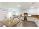Bright kitchen features granite counters, stainless steel appliances, and white cabinets at 913 Hickory Park St, Las Vegas, NV 89138