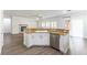 Modern kitchen featuring stainless steel appliances, granite countertops, and a convenient breakfast bar at 913 Hickory Park St, Las Vegas, NV 89138