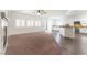 Spacious living room featuring a modern kitchen and plantation shutters at 913 Hickory Park St, Las Vegas, NV 89138