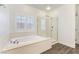 Main bathroom features a separate tub and a glass-enclosed shower at 913 Hickory Park St, Las Vegas, NV 89138