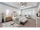 Serene bedroom with a seating area and ample natural light at 913 Hickory Park St, Las Vegas, NV 89138