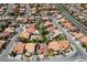 A high-level aerial view of the community with mature landscaping, desert landscaping, and tile roofs at , Las Vegas, NV 89113