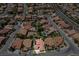 Aerial view with a property line shows the proximity to neighborhood amenities and desert landscaping at , Las Vegas, NV 89113