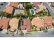 The aerial view shows the pool in the backyard and the desert landscaping of the neighborhood at , Las Vegas, NV 89113