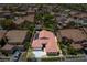 An aerial view with a property line highlights the desert landscaping and solar panels on the home at , Las Vegas, NV 89113