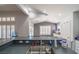 Kitchen with stainless steel sink, dark countertops, and ample counter space looking into the living area at , Las Vegas, NV 89113