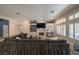 Bright living room features a fireplace, built-in shelving, and shuttered windows at , Las Vegas, NV 89113