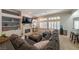 Cozy living room featuring a fireplace, built-in shelving, and a large sectional sofa at , Las Vegas, NV 89113
