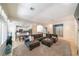 Living room with a fireplace opening up to the kitchen with a peninsula at , Las Vegas, NV 89113