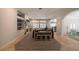 Spacious living room with natural light, fireplace, built-in shelves, and tile flooring at , Las Vegas, NV 89113