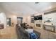 Open living room with a fireplace, neutral decor, and tile flooring at , Las Vegas, NV 89113