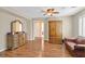 Bedroom showcasing wooden furniture, hardwood floors, and a cozy atmosphere at 10001 Blairwood Ct, Las Vegas, NV 89178