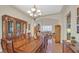 Elegant dining room featuring beautiful hardwood floors and designer lighting at 10001 Blairwood Ct, Las Vegas, NV 89178