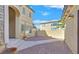 The exterior features a beautifully paved walkway and patio, enhanced by a charming courtyard at 10001 Blairwood Ct, Las Vegas, NV 89178