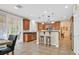 Well-lit kitchen features granite countertops and convenient breakfast bar seating at 10001 Blairwood Ct, Las Vegas, NV 89178