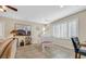 Elegant room featuring a white piano and a window with stylish shutters at 10001 Blairwood Ct, Las Vegas, NV 89178