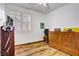 Bedroom with wooden floors, wooden furniture and a big window at 1008 Welkin St, Henderson, NV 89052