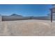 Generous backyard with a sturdy block wall, presenting an expansive area ready for personalization and landscaping at 10184 Juniper Valley St, Las Vegas, NV 89166