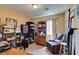 Functional bedroom features room for storage and seating at 10583 Mann St, Las Vegas, NV 89141