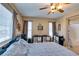 This bedroom has a large window letting in natural light at 10583 Mann St, Las Vegas, NV 89141