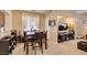 Dining area seamlessly connects to the living area, perfect for entertaining or everyday meals at 10583 Mann St, Las Vegas, NV 89141