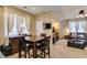 Cozy dining room with natural light and open access to the living area, perfect for Gathering gatherings at 10583 Mann St, Las Vegas, NV 89141