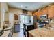 Well-equipped kitchen with stainless steel appliances and granite countertops, ready for your culinary adventures at 10583 Mann St, Las Vegas, NV 89141