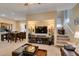 The open floor plan connects the living space to the dining area for easy interaction and entertaining at 10583 Mann St, Las Vegas, NV 89141