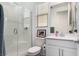 Clean, modern bathroom featuring white subway tile shower and single sink vanity at 12332 Switchgrass Ave, Las Vegas, NV 89138