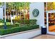 Well maintained exterior of a commercial building with a Starbucks sign and manicured landscaping at 125 E Harmon Ave # 1918, Las Vegas, NV 89109
