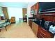 This charming kitchenette features updated appliances and a comfortable dining space at 125 E Harmon Ave # 1918, Las Vegas, NV 89109