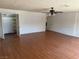 Bedroom with laminate floors and natural light at 1674 Seneca Ln, Las Vegas, NV 89169