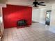 Bright room featuring a unique red brick fireplace and tile flooring throughout at 1674 Seneca Ln, Las Vegas, NV 89169
